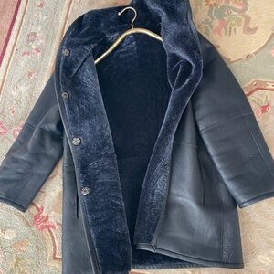 Leather jacket with shearling lining
